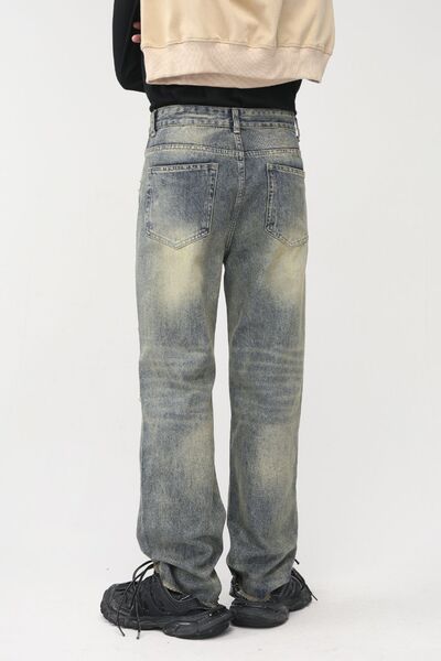 Distressed Mid Rise Jeans with Pockets.